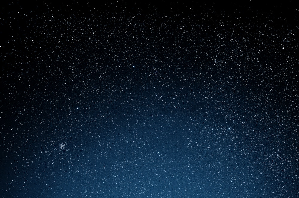 blue sky with stars during night time