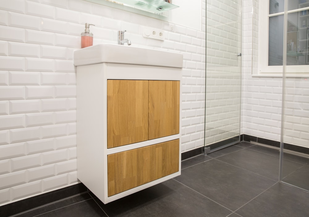 white and brown wooden cabinet