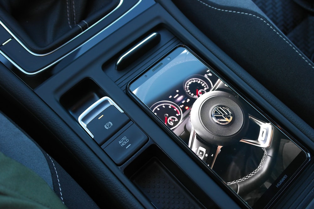 black and silver car gear shift lever