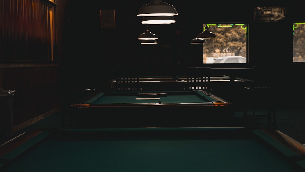 blue and black billiard table