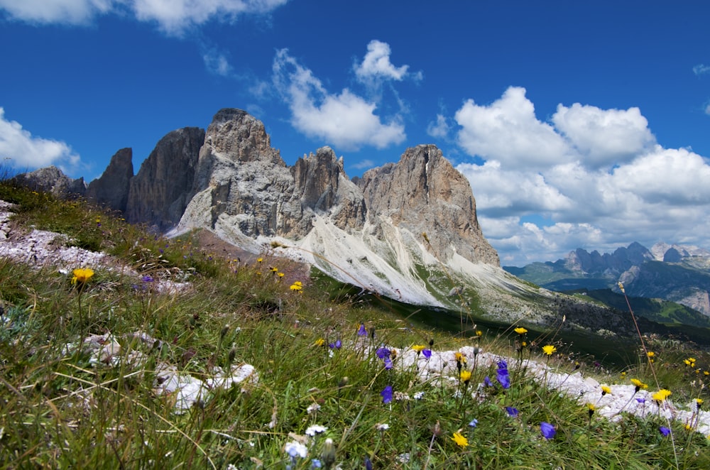 gray rocky mountain under blue sky during daytime