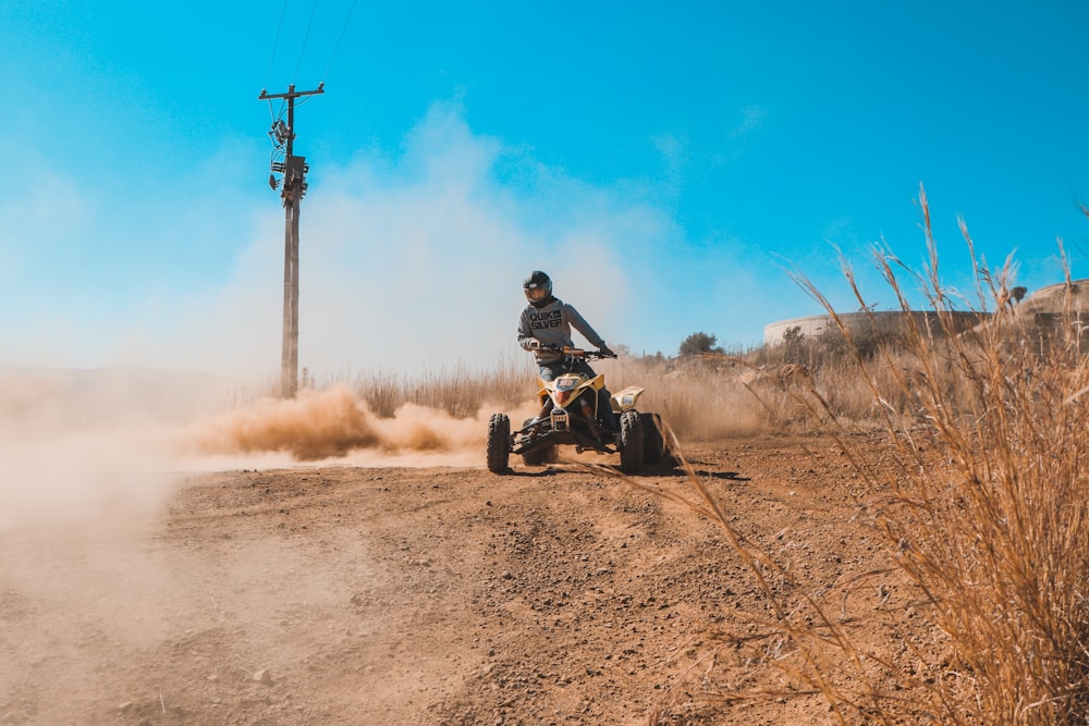 man in black jacket riding on black motorcycle during daytime