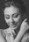 A serene image of a woman smiling, symbolizing love and happiness.
