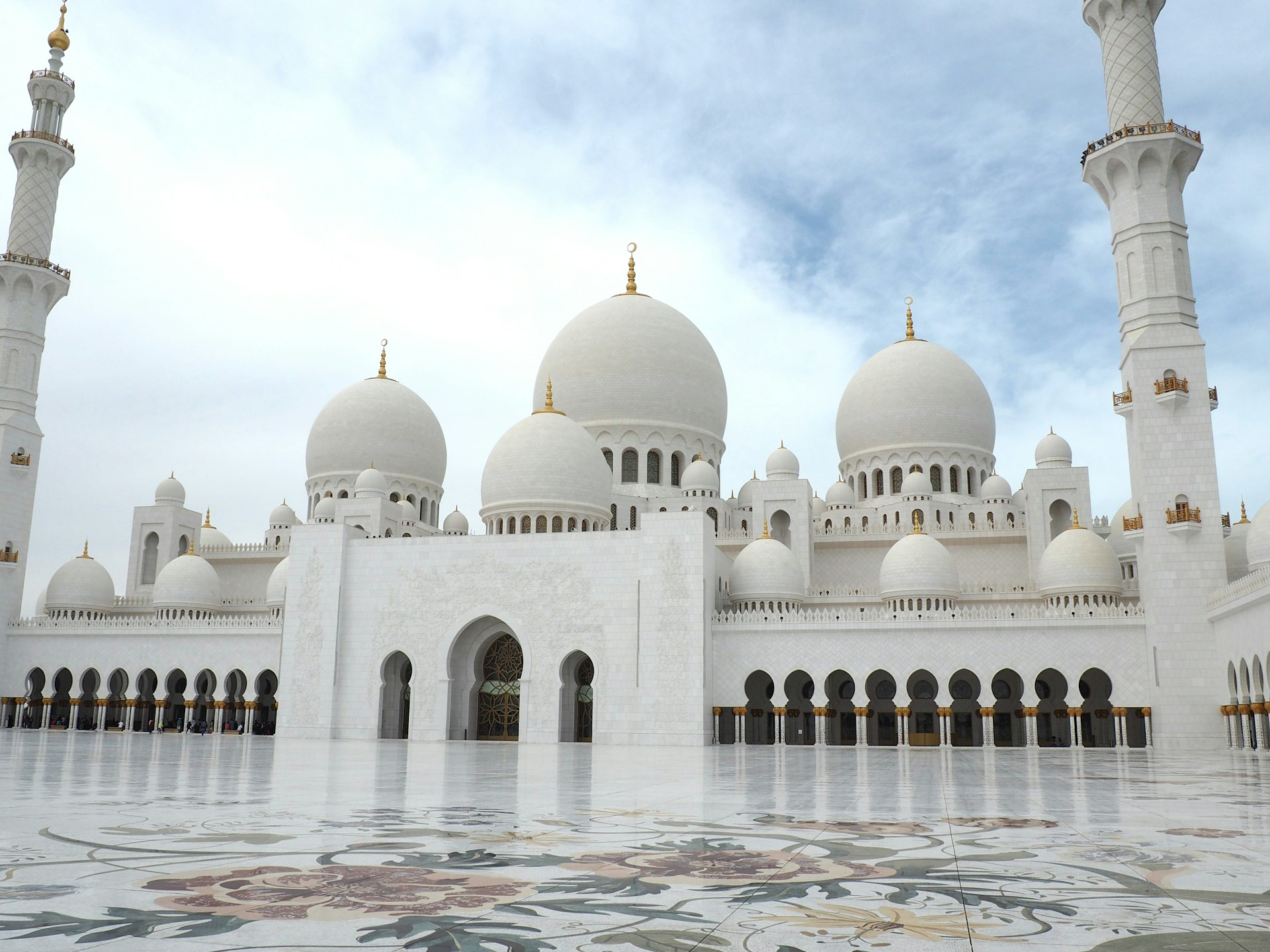white dome building under cloudy sky during daytime