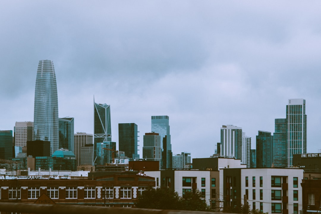 city buildings under gray sky during daytime
