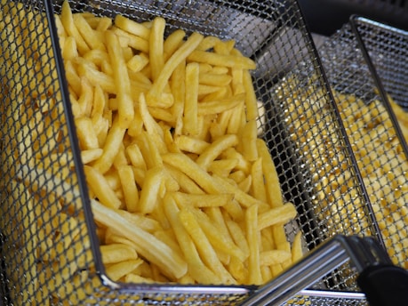 yellow pasta on stainless steel shopping cart