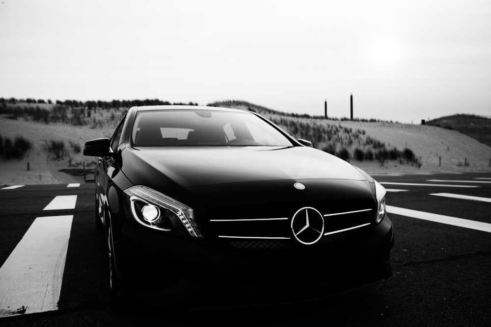 grayscale photo of mercedes benz coupe