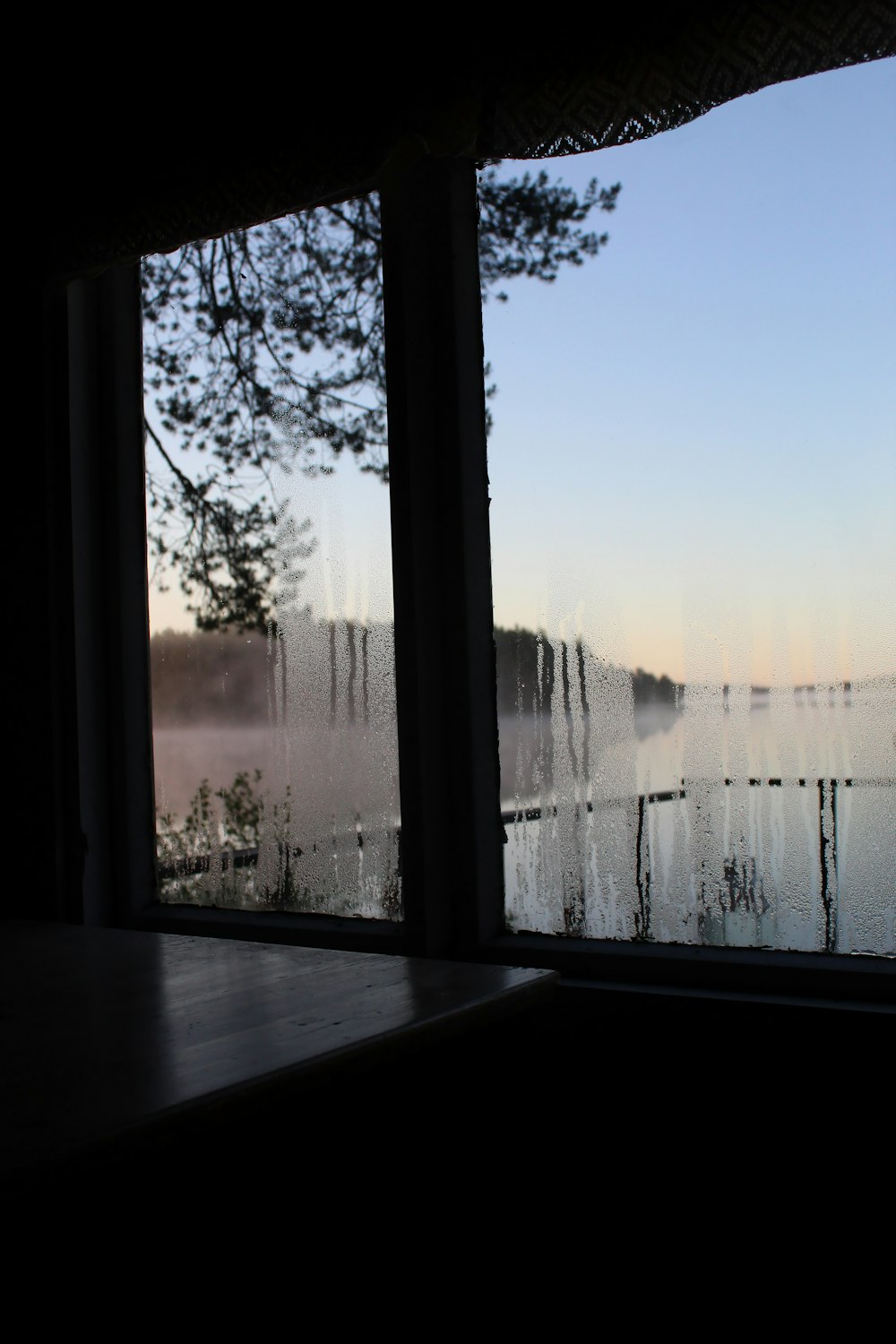 white wooden framed glass window