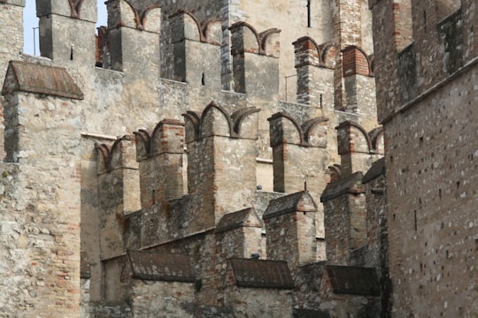 brown and gray concrete building in Sirmione Italy