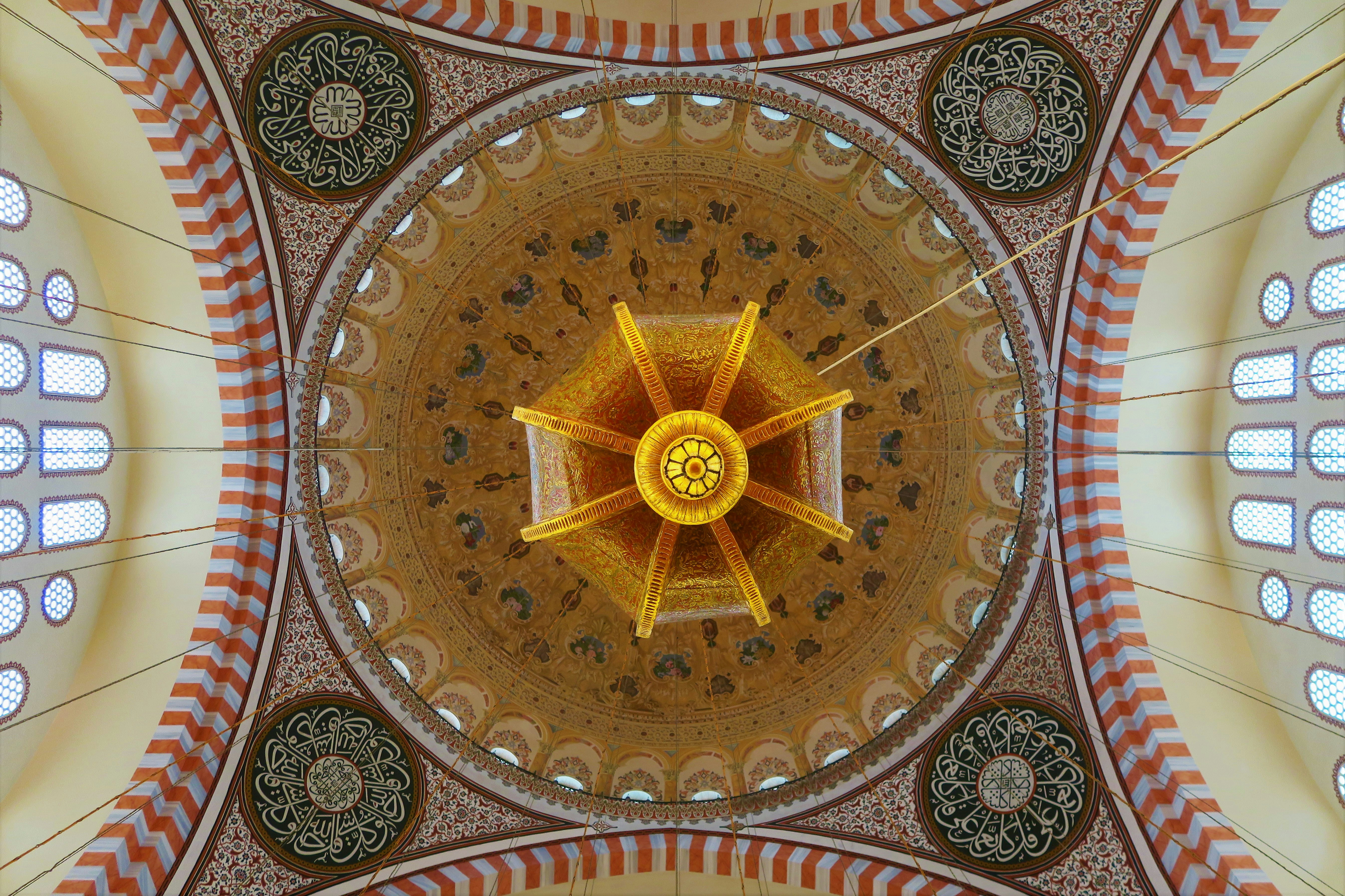 brown and yellow sun wall decor