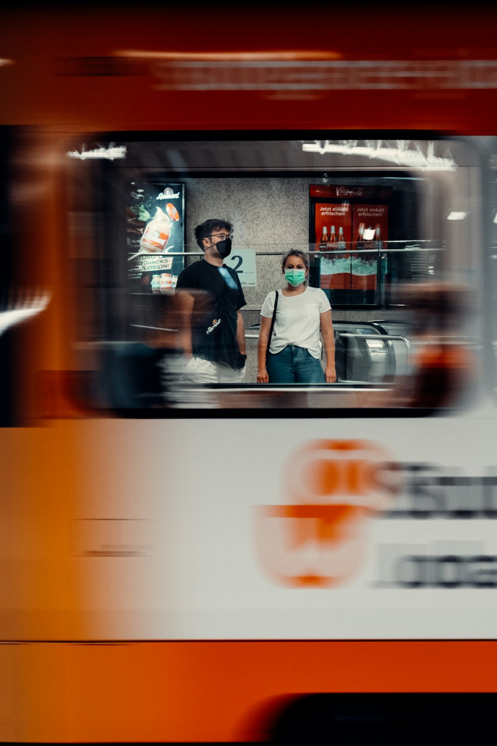 man in white dress shirt standing beside woman in white dress shirt