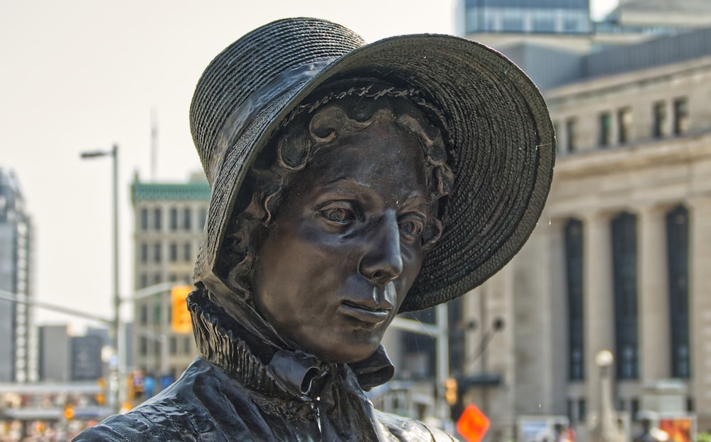 man in black hat and blue jacket