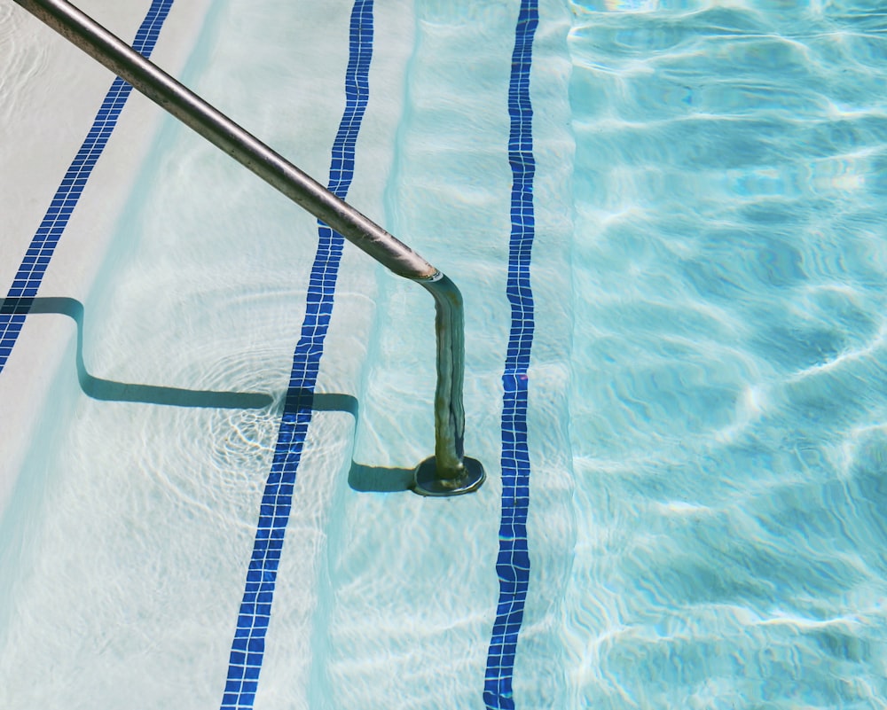 black strap on blue swimming pool