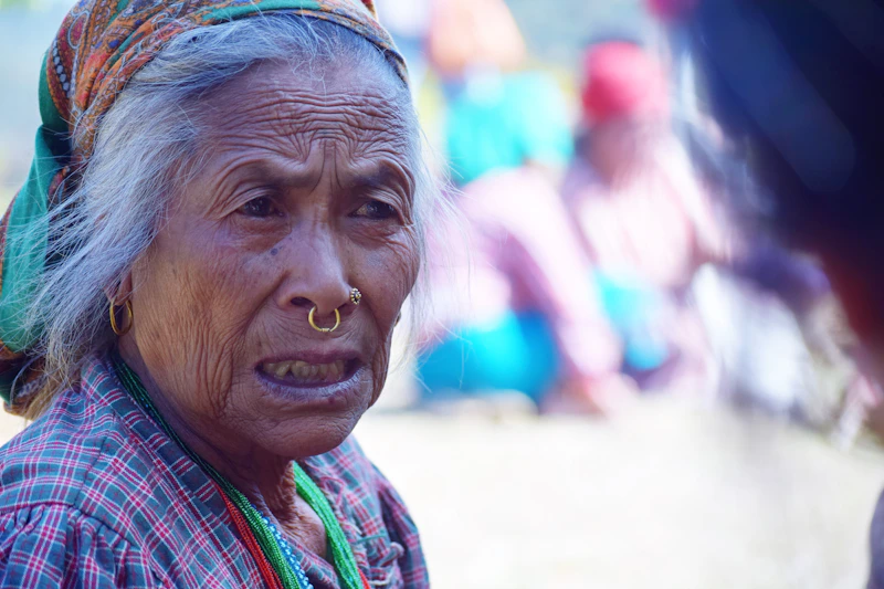Wise Indian woman with traditional nose jewelry