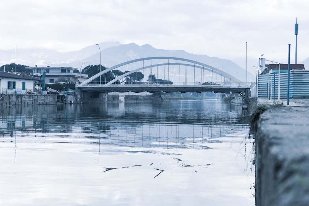 white bridge over river during daytime
