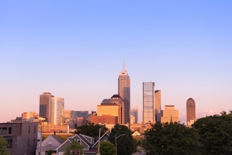 city skyline under blue sky during daytime
