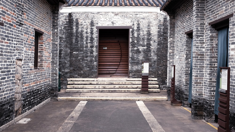 brown wooden bench near brown wooden door