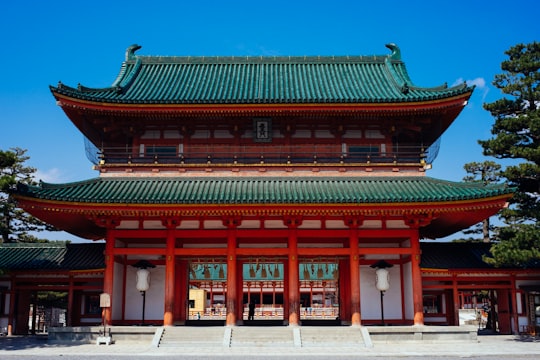 brown and white concrete building in Heian Shrine Japan