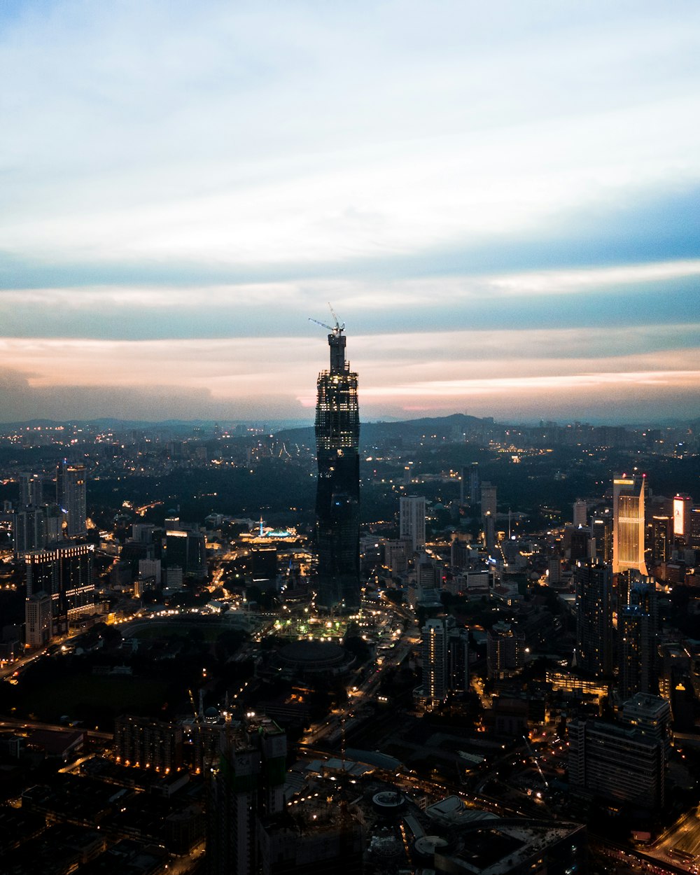 city skyline under blue sky during daytime