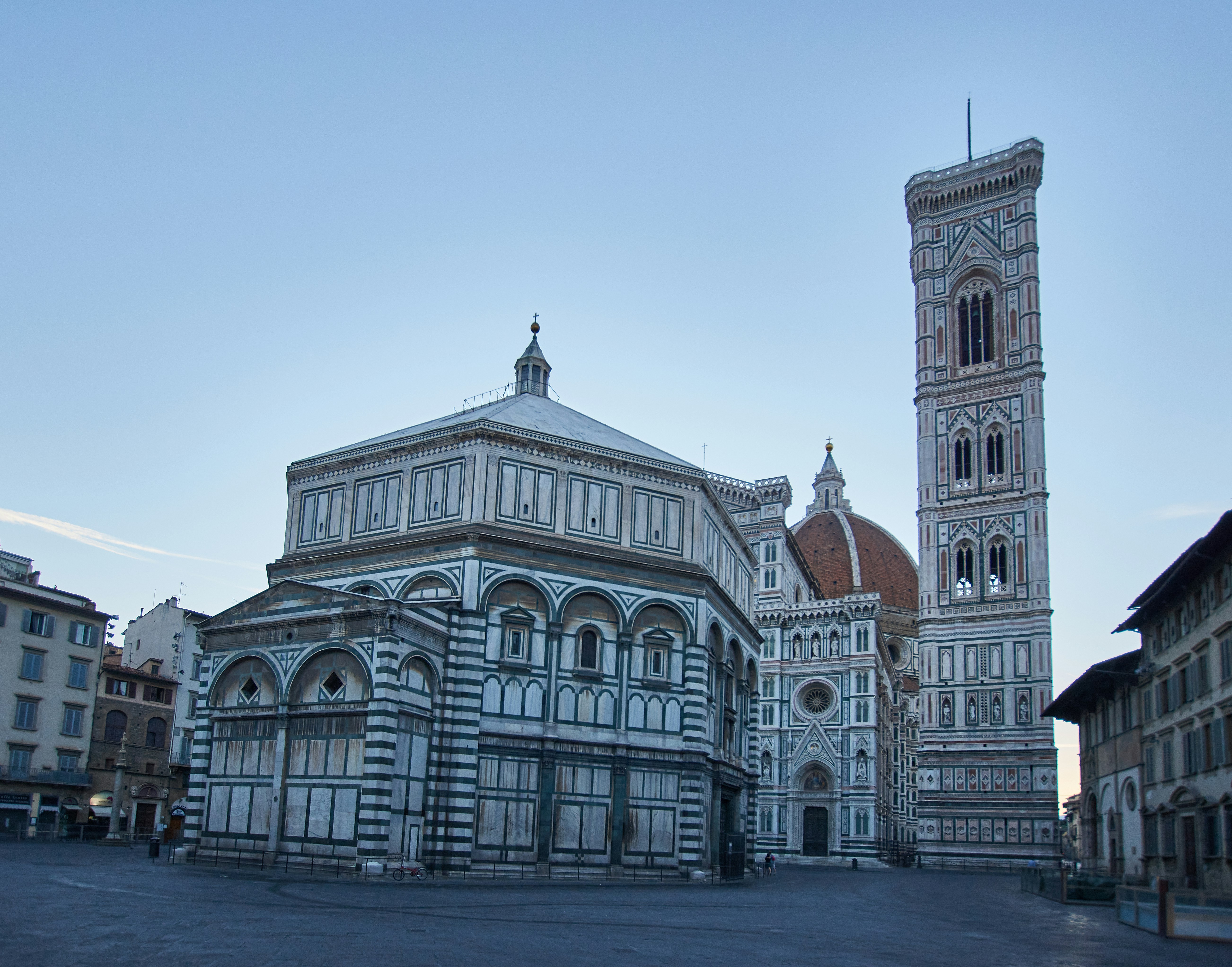 white and brown concrete building under blue sky during daytime