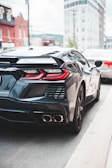 A sleek, modern car parked on a city street.