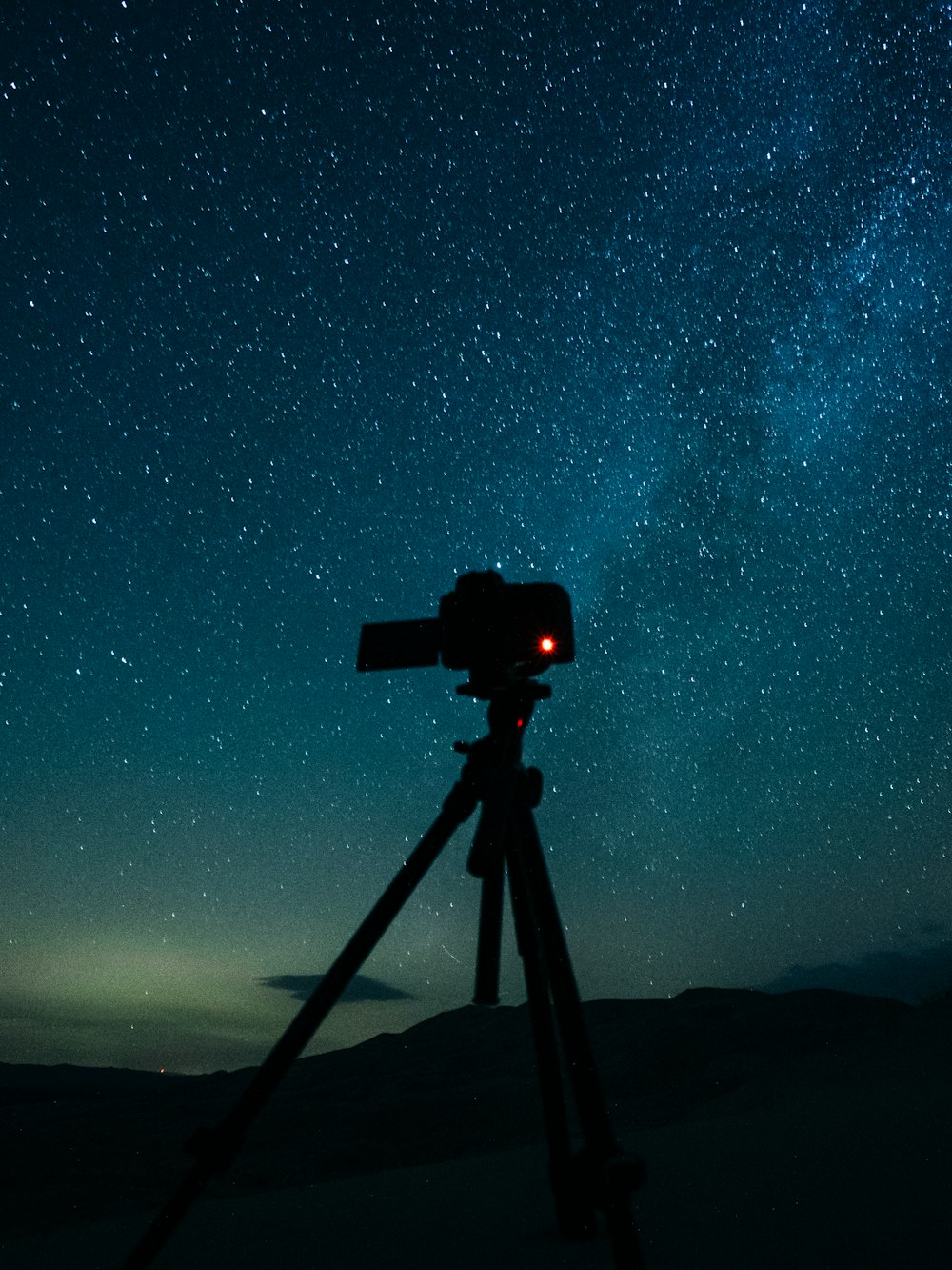 black camera on tripod under starry night photo – Free Grey Image on  Unsplash