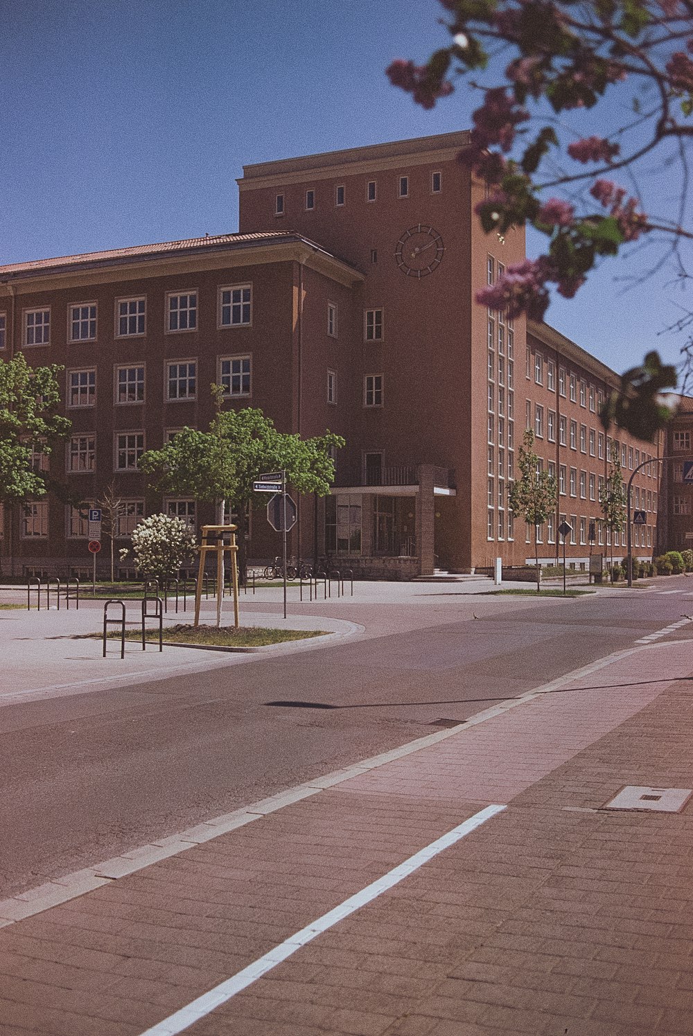 brown concrete building near trees during daytime