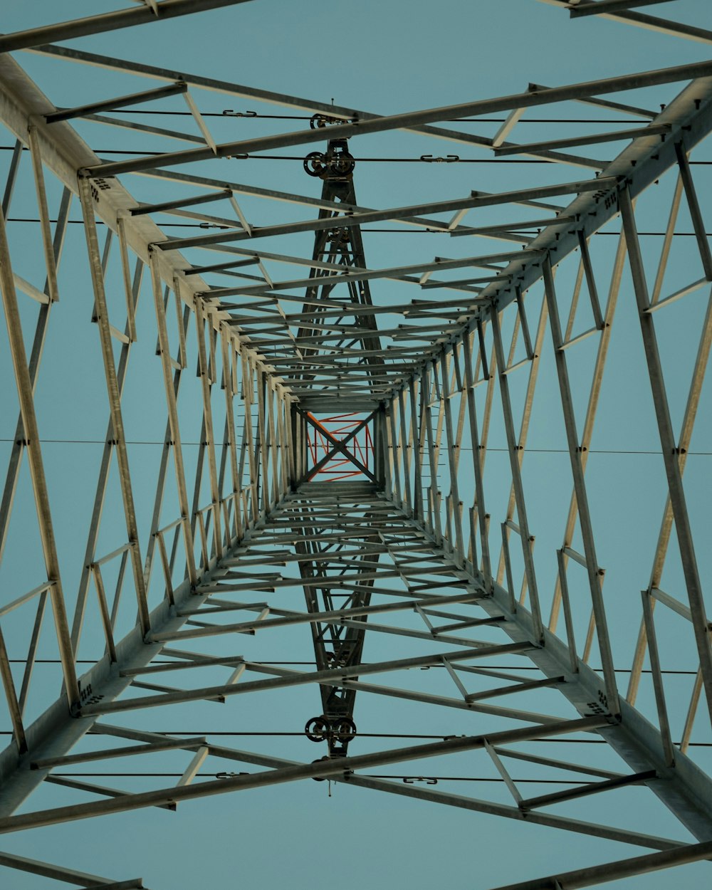 a very tall metal structure with a sky in the background