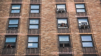 Modern aluminum window installation in a residential building.