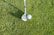 white golf club on green grass field