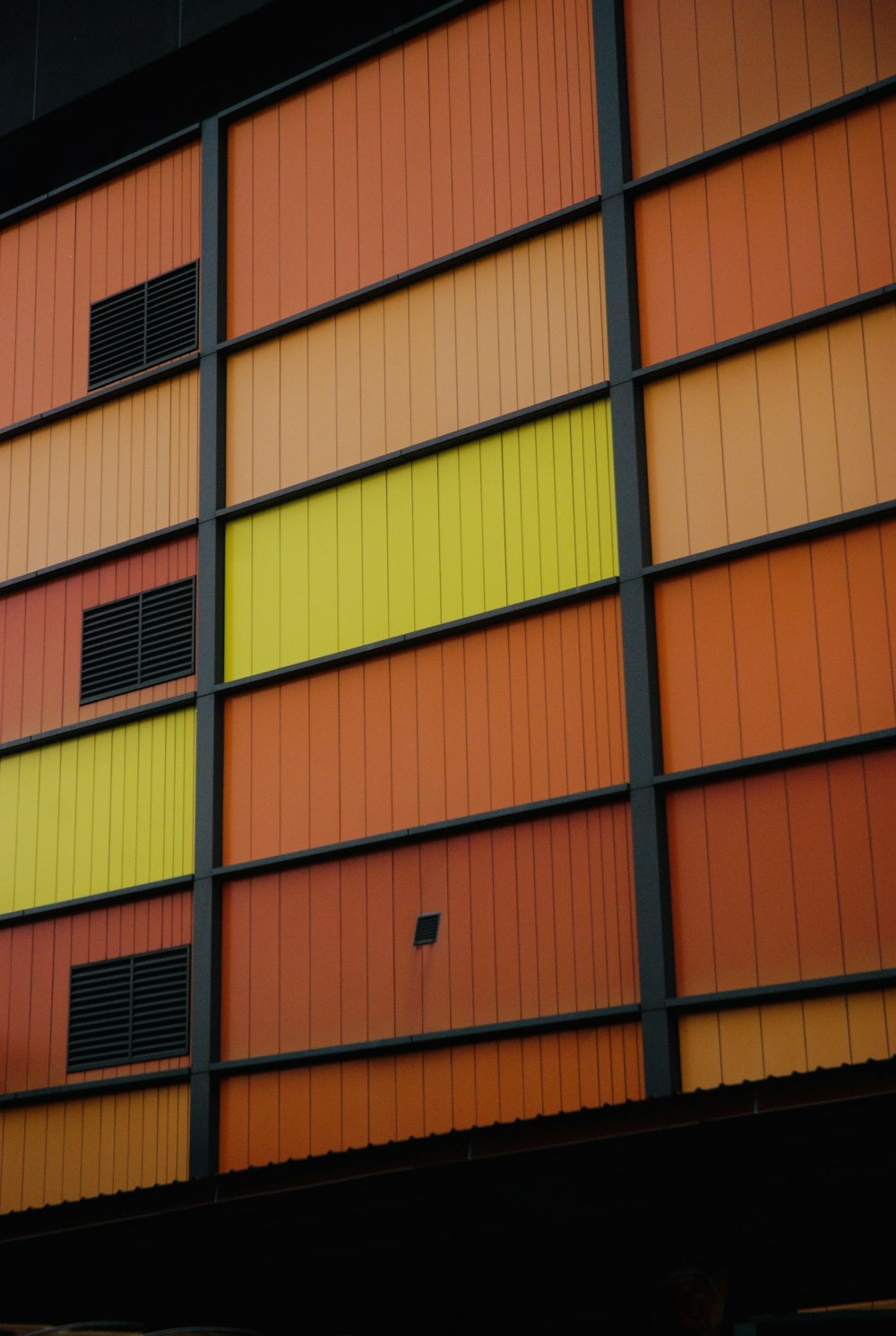 brown and green concrete building