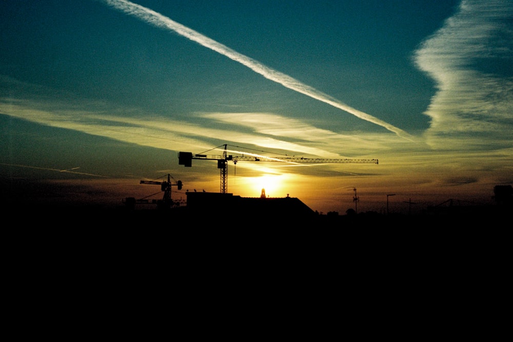 silhouette of building during sunset