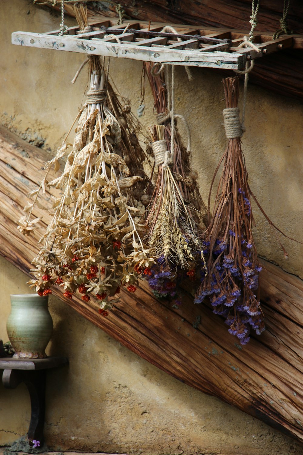 brown woven stick on brown wooden wall