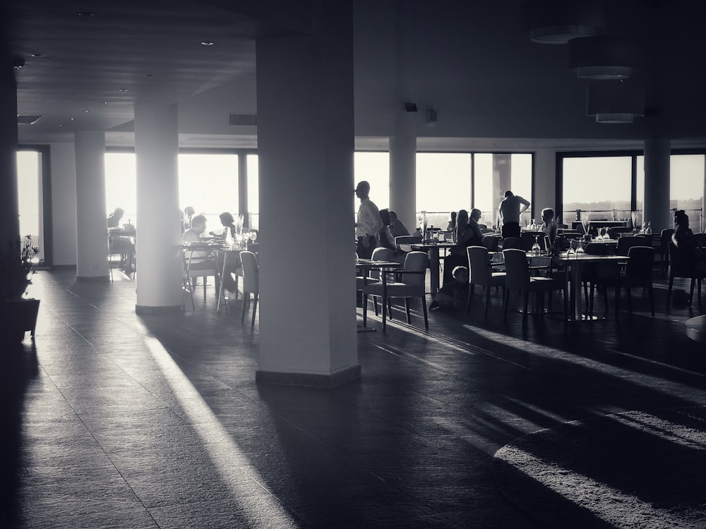 people sitting on chair inside building