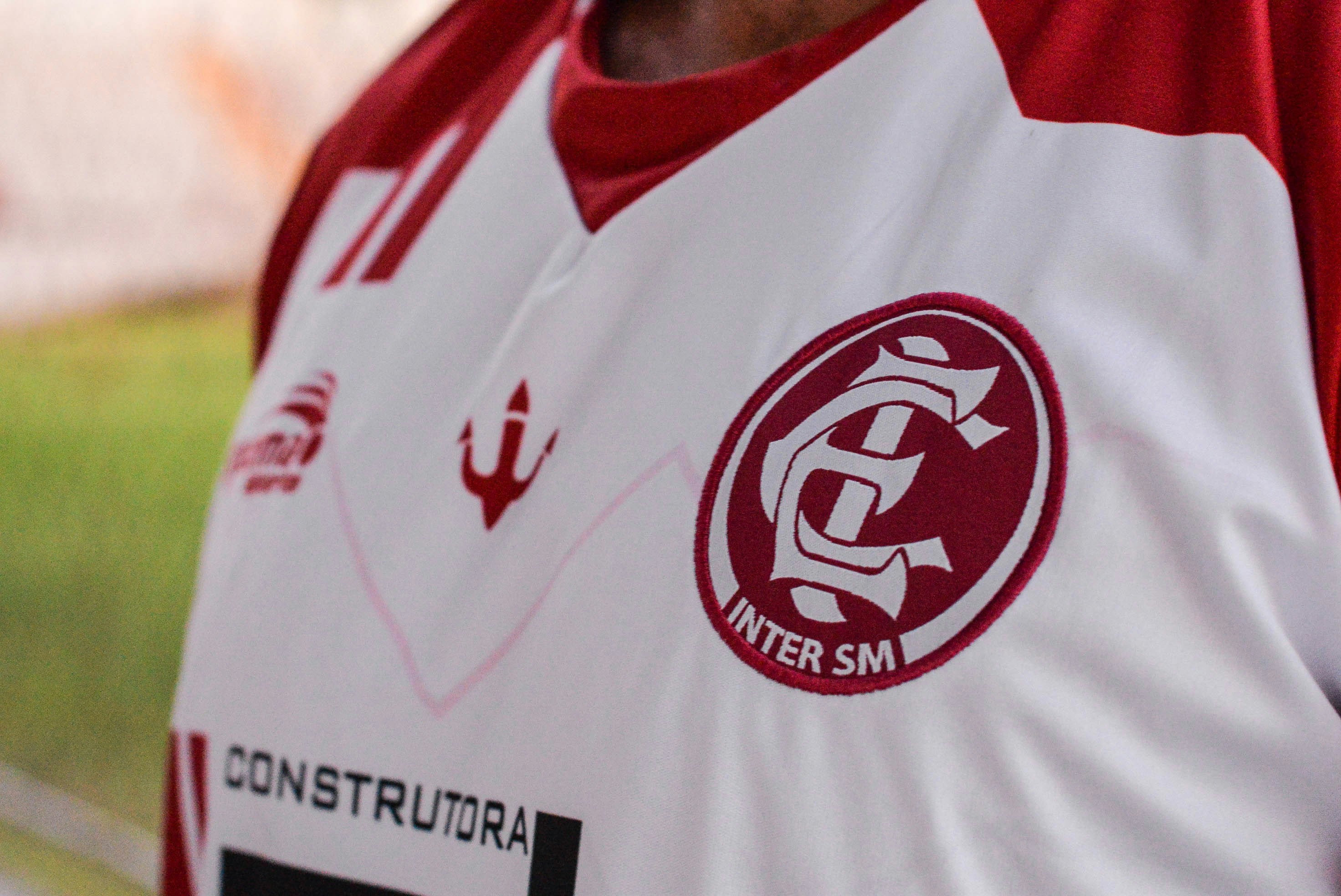 gray and red nike shirt