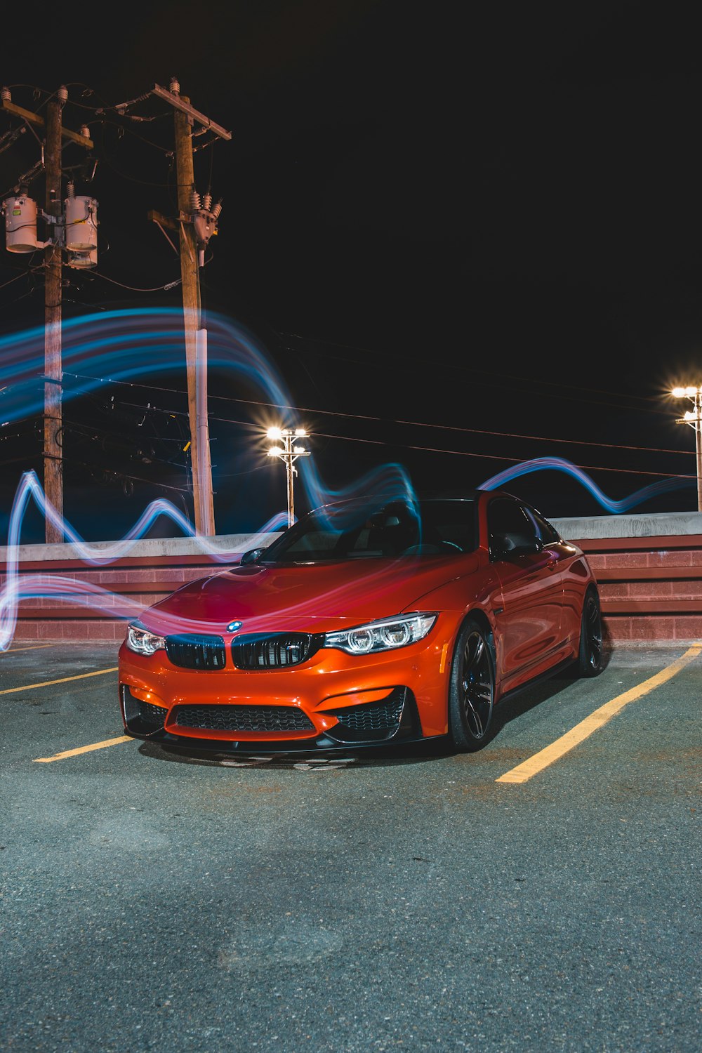 red bmw m 3 coupe on road during nighttime