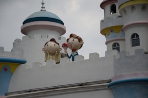 Playful illustration of a child exploring a castle with friendly dragons