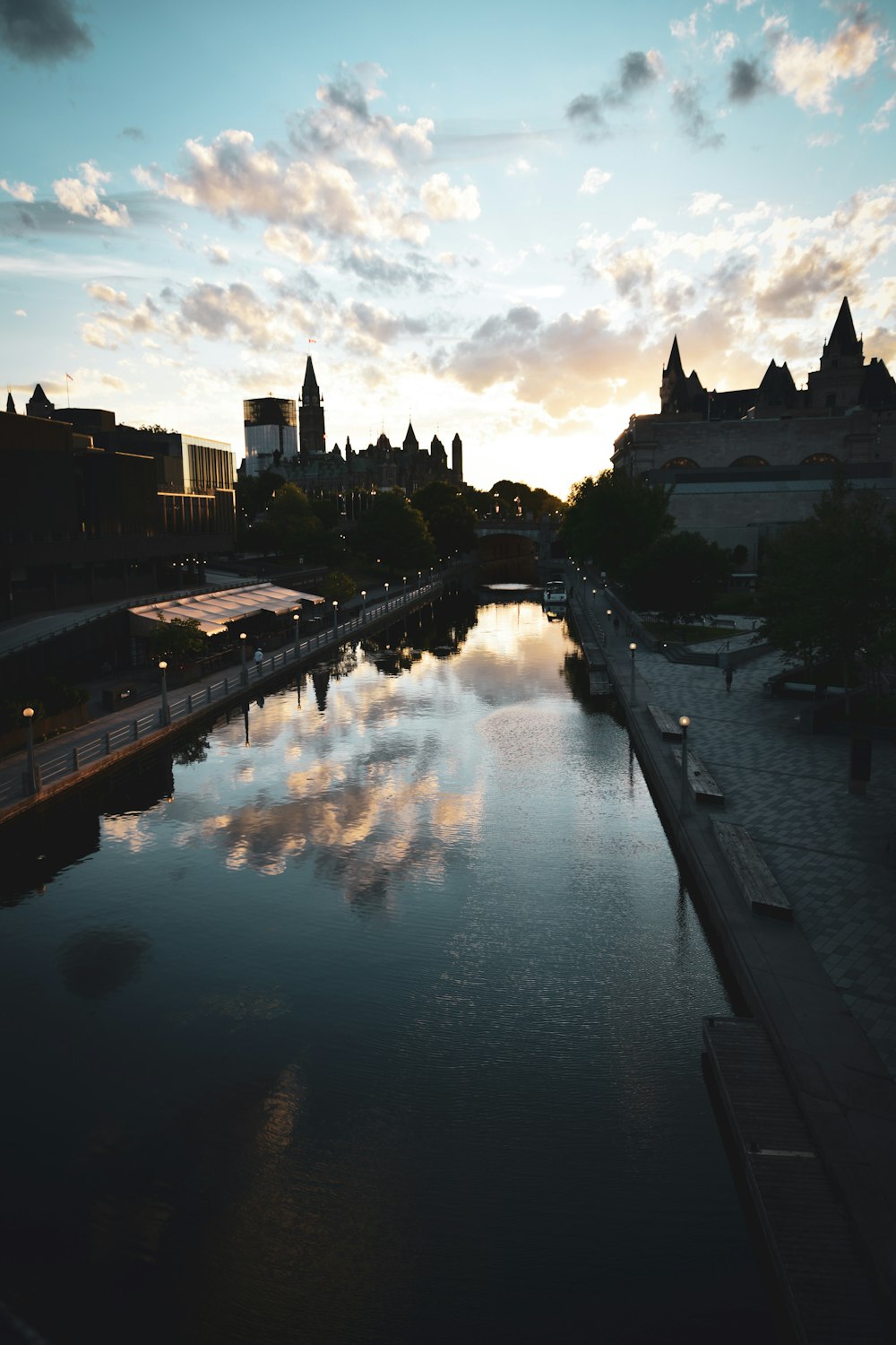 body of water near buildings during daytime