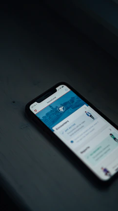 A heart rhythm and rate device displayed alongside a smartphone showing the thriveq heart health platform.