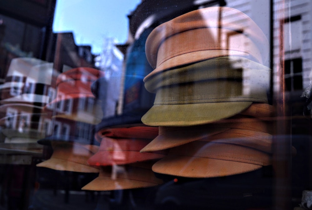 brown and black hat on brown wooden table