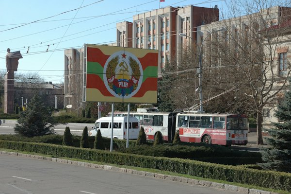 Red and white bus on road during daytime — Tiraspol, Moldova