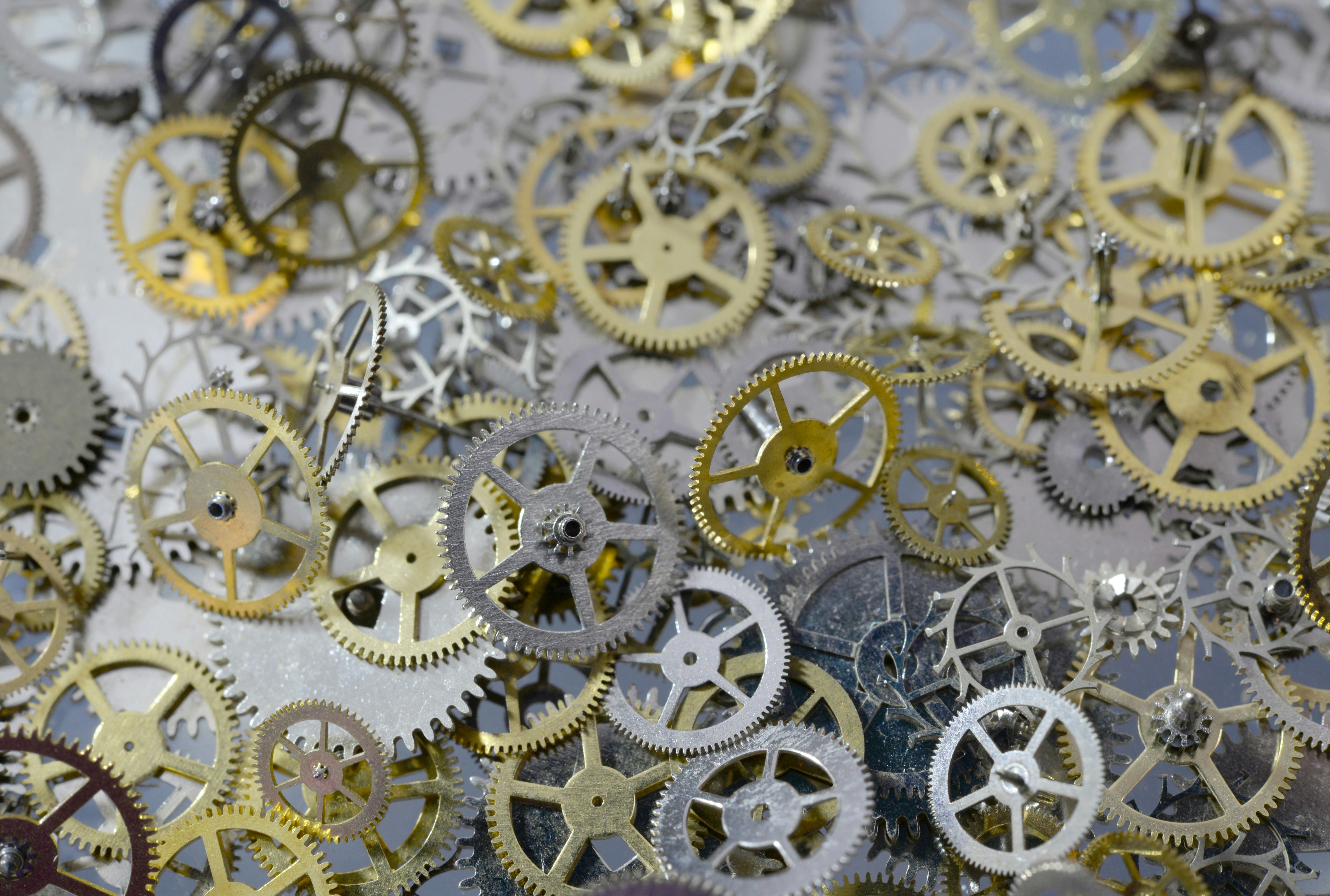 Macro of metal gears, cogs and wheels from old watches.