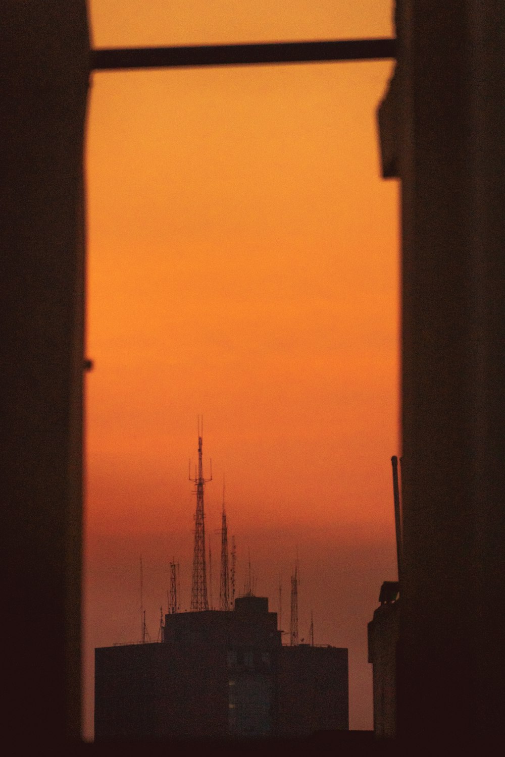 silhouette of tower during sunset