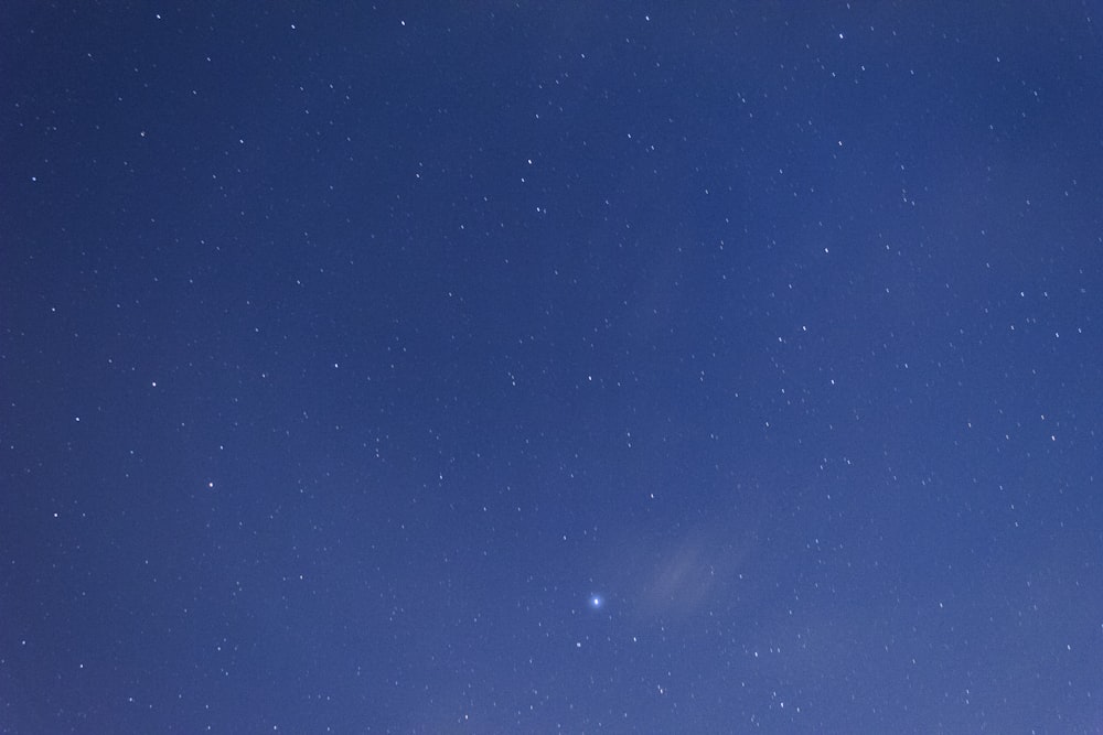 blue sky with stars during night time