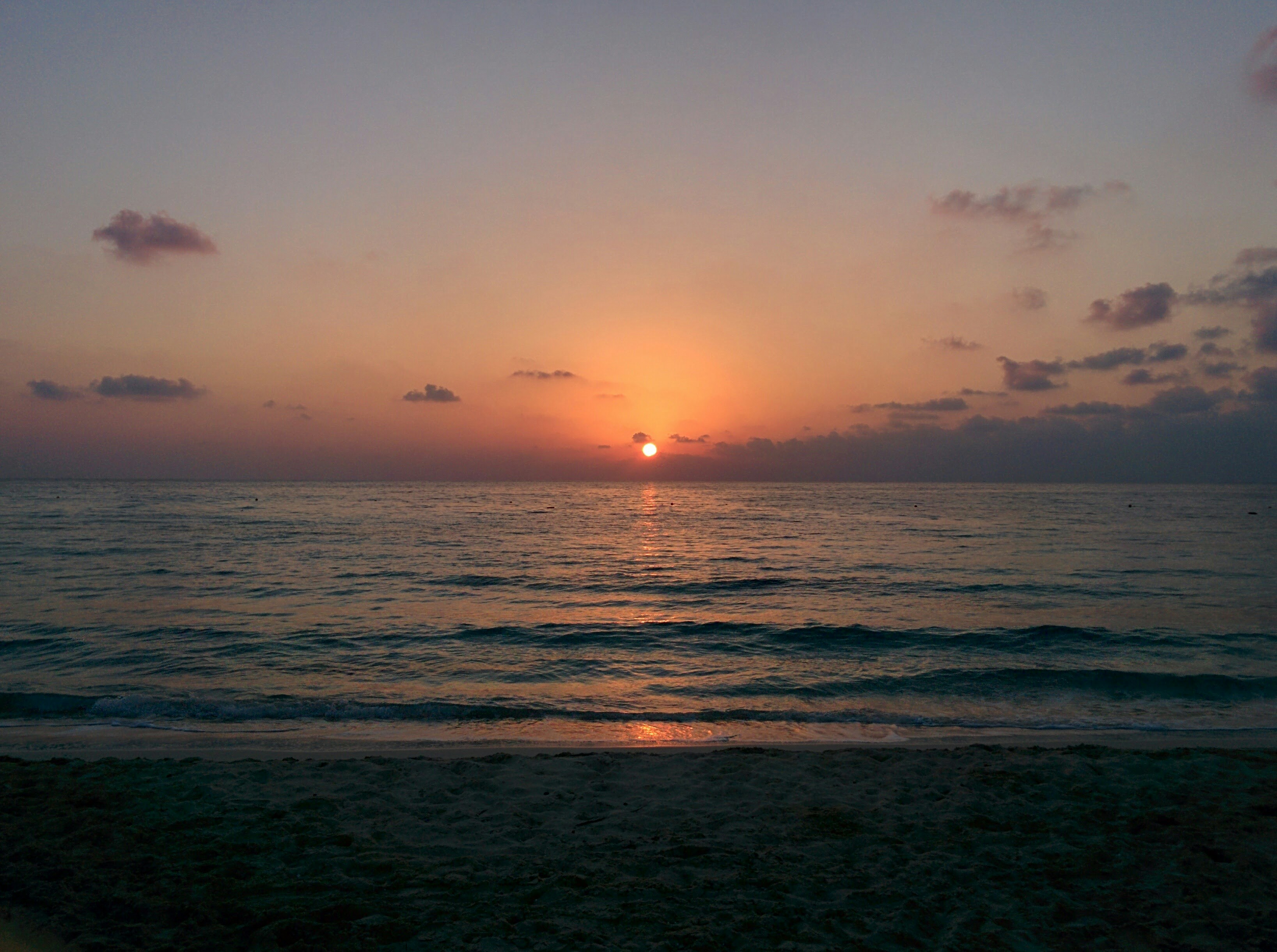 The sun rises out of the Mediterranean sea in the North Coast of Egypt