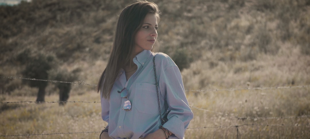 woman in blue long sleeve shirt