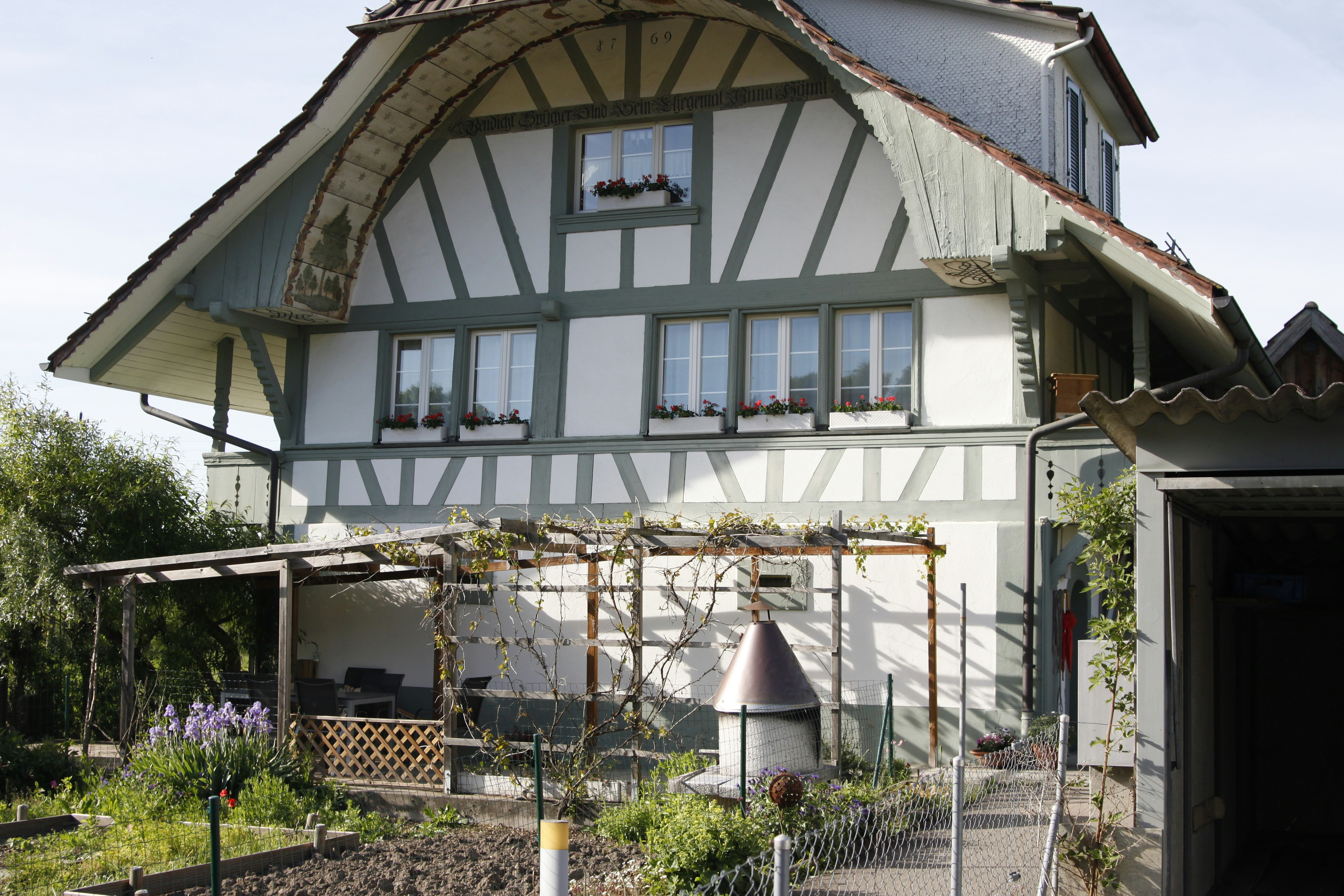 white and brown wooden house