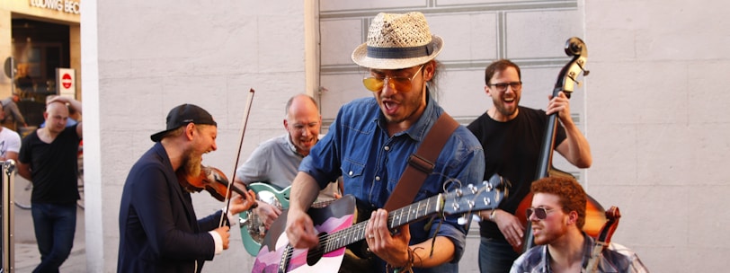 group of men playing musical instruments