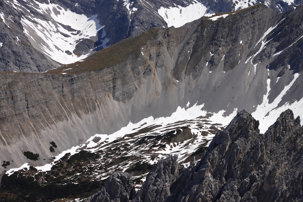 snow covered mountain during daytime