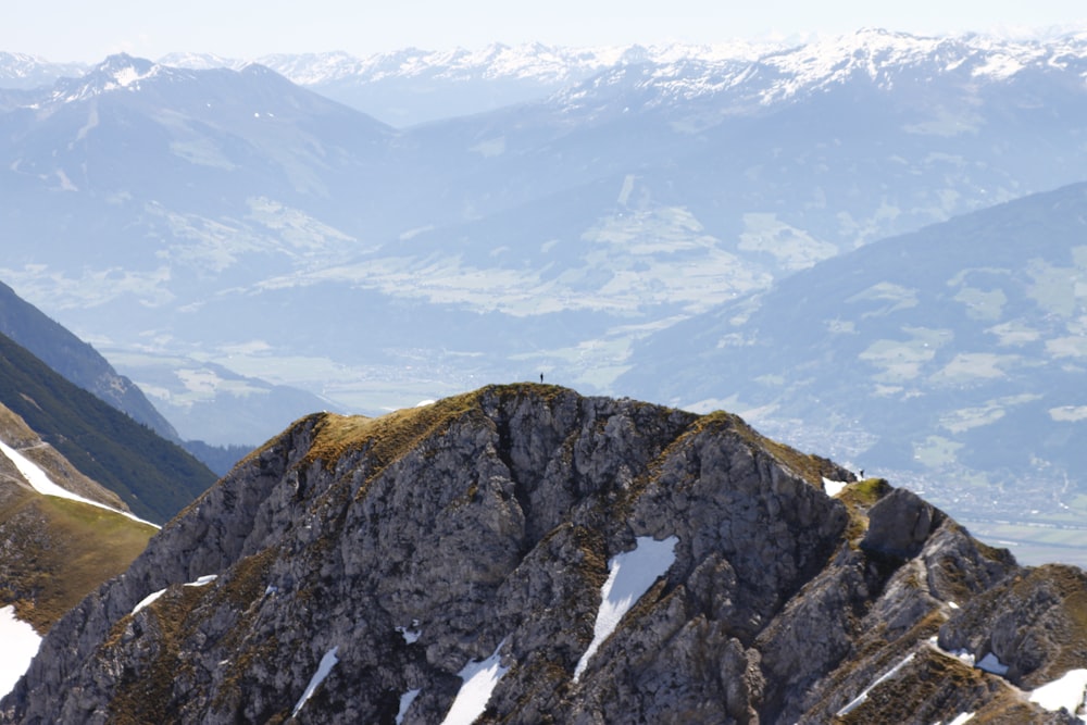 brown and gray rocky mountain under white sky during daytime